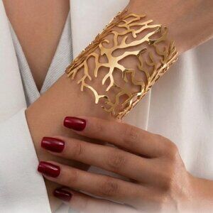 Gold Tone Wide Cuff Bracelet with Abstract Branch Cutout Design